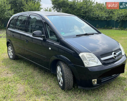Черный Опель Мерива, объемом двигателя 1.4 л и пробегом 153 тыс. км за 4433 $, фото 1 на Automoto.ua