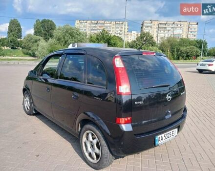 Черный Опель Мерива, объемом двигателя 1.6 л и пробегом 230 тыс. км за 4100 $, фото 2 на Automoto.ua