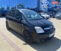 Черный Опель Мерива, объемом двигателя 1.7 л и пробегом 171 тыс. км за 4500 $, фото 1 на Automoto.ua