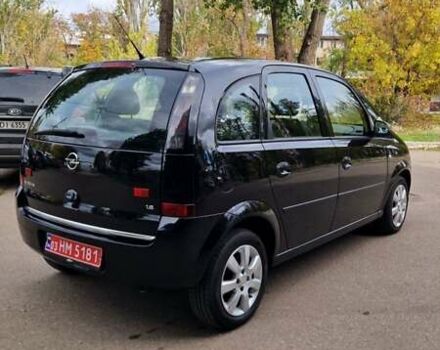 Черный Опель Мерива, объемом двигателя 1.6 л и пробегом 245 тыс. км за 5500 $, фото 3 на Automoto.ua