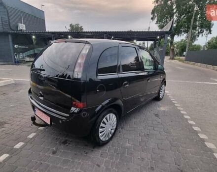 Черный Опель Мерива, объемом двигателя 1.6 л и пробегом 212 тыс. км за 4900 $, фото 6 на Automoto.ua