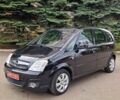 Черный Опель Мерива, объемом двигателя 1.6 л и пробегом 245 тыс. км за 5500 $, фото 1 на Automoto.ua