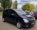 Черный Опель Мерива, объемом двигателя 1.6 л и пробегом 245 тыс. км за 5500 $, фото 1 на Automoto.ua