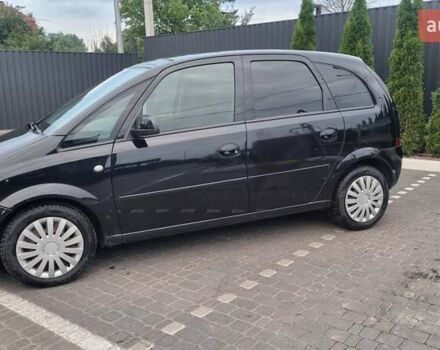 Черный Опель Мерива, объемом двигателя 1.6 л и пробегом 212 тыс. км за 4900 $, фото 2 на Automoto.ua