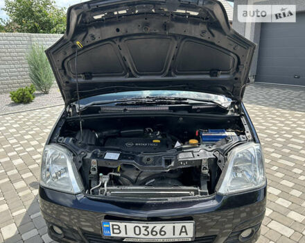 Опель Меріва 2006 у Полтаві на Automoto.ua Чорний Опель Меріва, об'ємом двигуна 1.6 л та пробігом 201 тис. км за 4999 $, фото 144 на Automoto.ua