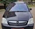Черный Опель Мерива, объемом двигателя 1.6 л и пробегом 245 тыс. км за 5500 $, фото 7 на Automoto.ua