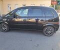 Черный Опель Мерива, объемом двигателя 1.6 л и пробегом 261 тыс. км за 4600 $, фото 12 на Automoto.ua