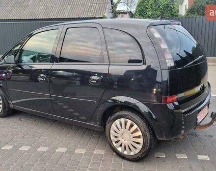 Черный Опель Мерива, объемом двигателя 1.6 л и пробегом 212 тыс. км за 4900 $, фото 3 на Automoto.ua