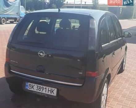 Черный Опель Мерива, объемом двигателя 1.6 л и пробегом 217 тыс. км за 4950 $, фото 6 на Automoto.ua