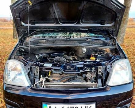 Черный Опель Мерива, объемом двигателя 1.6 л и пробегом 280 тыс. км за 4300 $, фото 38 на Automoto.ua