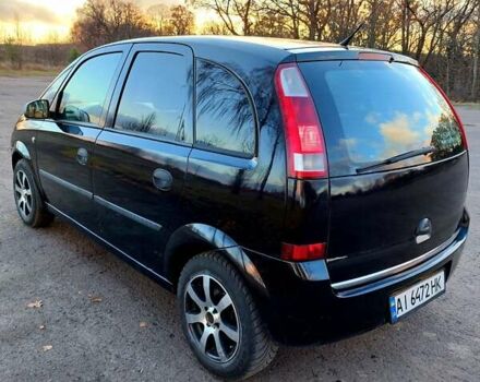 Черный Опель Мерива, объемом двигателя 1.6 л и пробегом 280 тыс. км за 4300 $, фото 7 на Automoto.ua