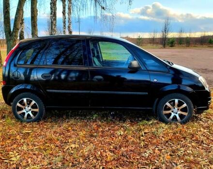 Черный Опель Мерива, объемом двигателя 1.6 л и пробегом 280 тыс. км за 4300 $, фото 16 на Automoto.ua