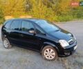 Черный Опель Мерива, объемом двигателя 1.6 л и пробегом 147 тыс. км за 5700 $, фото 2 на Automoto.ua