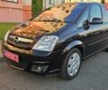 Черный Опель Мерива, объемом двигателя 1.4 л и пробегом 115 тыс. км за 4899 $, фото 1 на Automoto.ua