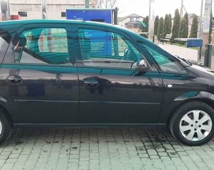Черный Опель Мерива, объемом двигателя 1.6 л и пробегом 217 тыс. км за 4950 $, фото 7 на Automoto.ua