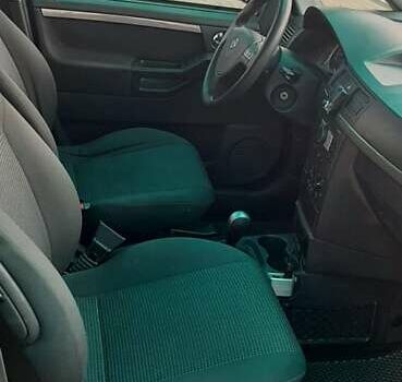 Черный Опель Мерива, объемом двигателя 1.6 л и пробегом 217 тыс. км за 4950 $, фото 17 на Automoto.ua