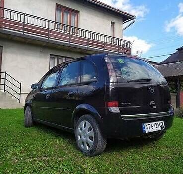 Черный Опель Мерива, объемом двигателя 1.3 л и пробегом 134 тыс. км за 4500 $, фото 2 на Automoto.ua