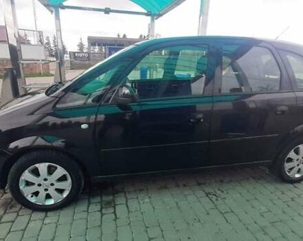 Черный Опель Мерива, объемом двигателя 1.6 л и пробегом 217 тыс. км за 4950 $, фото 13 на Automoto.ua