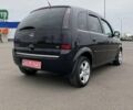 Черный Опель Мерива, объемом двигателя 1.6 л и пробегом 216 тыс. км за 4300 $, фото 1 на Automoto.ua