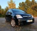 Черный Опель Мерива, объемом двигателя 1.6 л и пробегом 147 тыс. км за 5700 $, фото 1 на Automoto.ua