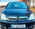 Черный Опель Мерива, объемом двигателя 1.6 л и пробегом 280 тыс. км за 4300 $, фото 11 на Automoto.ua