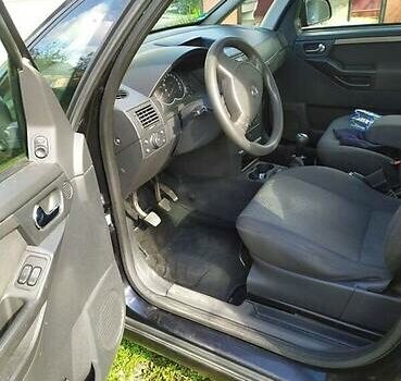 Черный Опель Мерива, объемом двигателя 1.3 л и пробегом 134 тыс. км за 4500 $, фото 4 на Automoto.ua