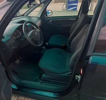 Черный Опель Мерива, объемом двигателя 1.6 л и пробегом 217 тыс. км за 4950 $, фото 15 на Automoto.ua