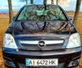 Черный Опель Мерива, объемом двигателя 1.6 л и пробегом 280 тыс. км за 4300 $, фото 19 на Automoto.ua
