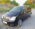 Черный Опель Мерива, объемом двигателя 1.6 л и пробегом 147 тыс. км за 5700 $, фото 5 на Automoto.ua