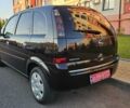 Черный Опель Мерива, объемом двигателя 1.4 л и пробегом 115 тыс. км за 4899 $, фото 7 на Automoto.ua
