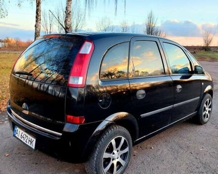 Черный Опель Мерива, объемом двигателя 1.6 л и пробегом 280 тыс. км за 4300 $, фото 44 на Automoto.ua