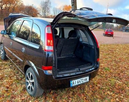 Черный Опель Мерива, объемом двигателя 1.6 л и пробегом 280 тыс. км за 4300 $, фото 42 на Automoto.ua