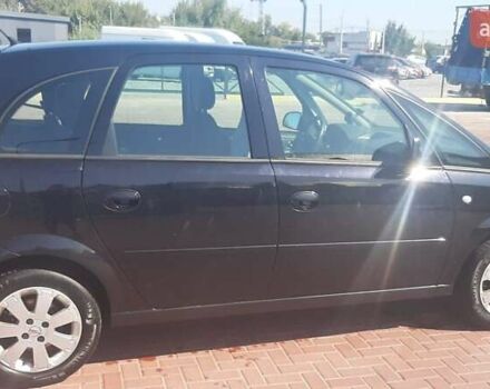 Черный Опель Мерива, объемом двигателя 1.6 л и пробегом 217 тыс. км за 4950 $, фото 3 на Automoto.ua