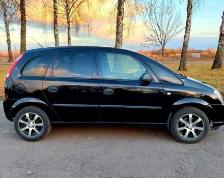 Черный Опель Мерива, объемом двигателя 1.6 л и пробегом 280 тыс. км за 4300 $, фото 6 на Automoto.ua