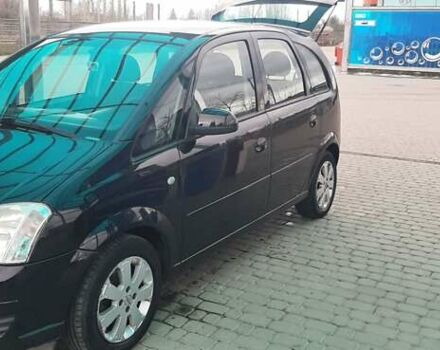 Черный Опель Мерива, объемом двигателя 1.6 л и пробегом 217 тыс. км за 4950 $, фото 10 на Automoto.ua