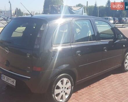 Черный Опель Мерива, объемом двигателя 1.6 л и пробегом 217 тыс. км за 4950 $, фото 5 на Automoto.ua