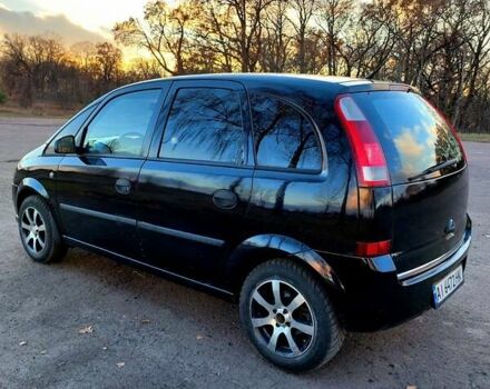 Черный Опель Мерива, объемом двигателя 1.6 л и пробегом 280 тыс. км за 4300 $, фото 4 на Automoto.ua