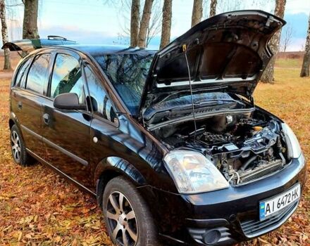 Черный Опель Мерива, объемом двигателя 1.6 л и пробегом 280 тыс. км за 4300 $, фото 40 на Automoto.ua