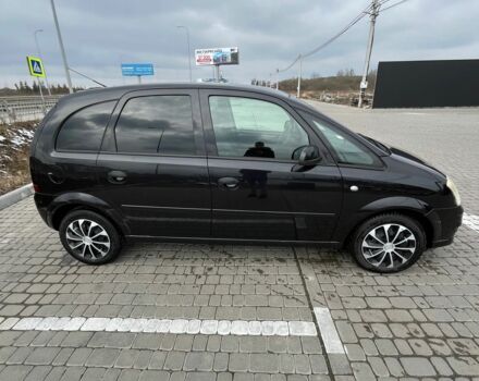 Черный Опель Мерива, объемом двигателя 1.8 л и пробегом 137 тыс. км за 4650 $, фото 1 на Automoto.ua