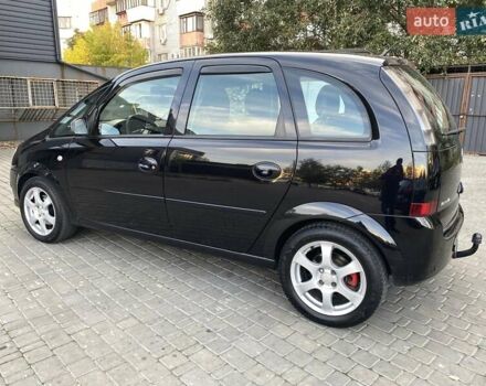 Черный Опель Мерива, объемом двигателя 1.8 л и пробегом 260 тыс. км за 5800 $, фото 5 на Automoto.ua
