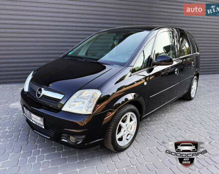 Черный Опель Мерива, объемом двигателя 1.6 л и пробегом 205 тыс. км за 6500 $, фото 2 на Automoto.ua