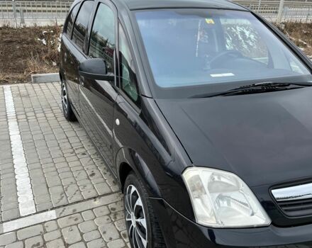 Черный Опель Мерива, объемом двигателя 1.8 л и пробегом 137 тыс. км за 4650 $, фото 4 на Automoto.ua