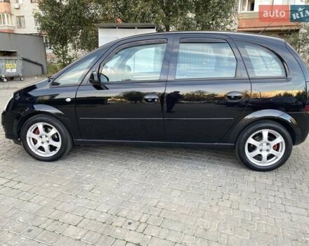 Черный Опель Мерива, объемом двигателя 1.8 л и пробегом 260 тыс. км за 5800 $, фото 3 на Automoto.ua