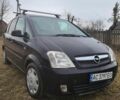 Черный Опель Мерива, объемом двигателя 1.6 л и пробегом 186 тыс. км за 3300 $, фото 2 на Automoto.ua