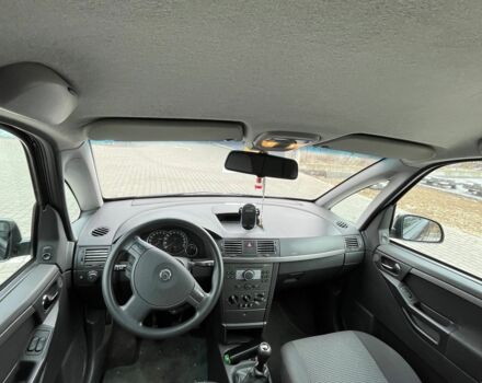 Черный Опель Мерива, объемом двигателя 1.8 л и пробегом 137 тыс. км за 4650 $, фото 5 на Automoto.ua