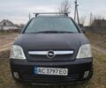 Черный Опель Мерива, объемом двигателя 1.6 л и пробегом 186 тыс. км за 3300 $, фото 1 на Automoto.ua
