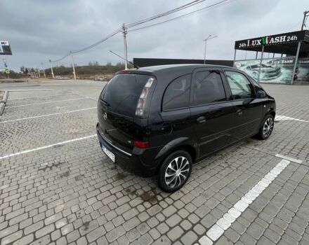 Черный Опель Мерива, объемом двигателя 1.8 л и пробегом 137 тыс. км за 4650 $, фото 2 на Automoto.ua