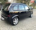 Черный Опель Мерива, объемом двигателя 1.8 л и пробегом 260 тыс. км за 5800 $, фото 14 на Automoto.ua