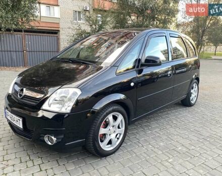 Черный Опель Мерива, объемом двигателя 1.8 л и пробегом 260 тыс. км за 5800 $, фото 1 на Automoto.ua