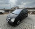 Черный Опель Мерива, объемом двигателя 1.8 л и пробегом 137 тыс. км за 4650 $, фото 1 на Automoto.ua